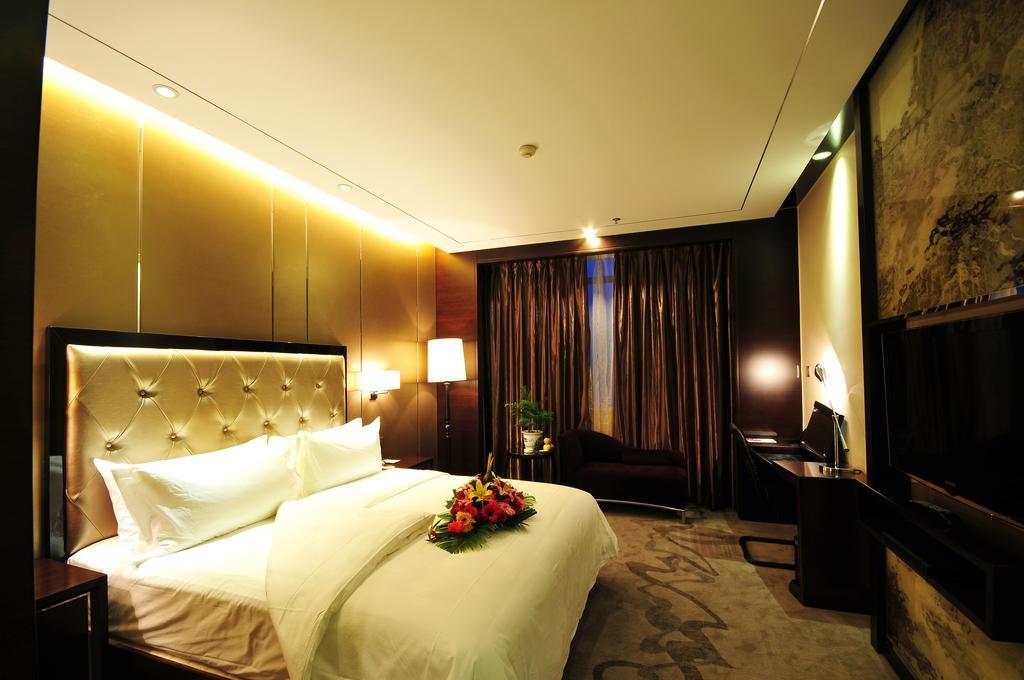 Xichang Minshan Hotel Oda fotoğraf